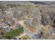 An aerial view shows several homes nicely spaced around the cul-de-sac at 2984 Superior Dr, Dacula, GA 30019