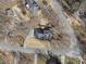 A high-angle view of the house shows its position on a private street at 2984 Superior Dr, Dacula, GA 30019