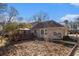 Backyard featuring a wooden deck area with gazebo alongside exterior house with landscaping at 2984 Superior Dr, Dacula, GA 30019