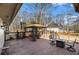 Spacious backyard deck area featuring a seating area with furniture, perfect for outdoor entertaining at 2984 Superior Dr, Dacula, GA 30019