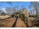 Brick home boasts a well-maintained lawn and features a charming front porch for welcoming guests at 2984 Superior Dr, Dacula, GA 30019