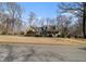 Charming brick home with a covered front porch and well-manicured lawn at 2984 Superior Dr, Dacula, GA 30019