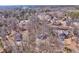 Aerial view of neighborhood, showcasing the home nestled among trees in a quiet residential community at 322 Corley Cir, Hiram, GA 30141