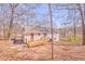 View of the backyard featuring a newly constructed wooden deck, perfect for outdoor relaxation at 322 Corley Cir, Hiram, GA 30141