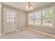 Bright dining area with access to outdoors and abundant natural light at 322 Corley Cir, Hiram, GA 30141