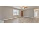 Bright living room with modern flooring, fireplace and front door at 322 Corley Cir, Hiram, GA 30141