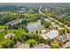 Aerial view of the community featuring a pool, tennis courts, pond, and playground at 4220 Cadmium Dr, Cumming, GA 30040