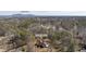 Aerial view of the beautiful home on Pine Mountain Rd with Kennesaw Mountain in the background at 2162 Pine Mountain Nw Rd, Kennesaw, GA 30152