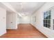 Large basement features hardwood floors, white walls and trim, windows, and recessed lighting at 2162 Pine Mountain Nw Rd, Kennesaw, GA 30152