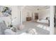 Spacious bedroom with light colored furniture, neutral walls, carpet, and lots of natural light at 2162 Pine Mountain Nw Rd, Kennesaw, GA 30152