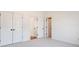 Neutral bedroom with three closets and white walls at 2162 Pine Mountain Nw Rd, Kennesaw, GA 30152