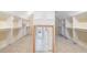 Spacious walk-in closet with ample shelving and custom storage solutions at 2162 Pine Mountain Nw Rd, Kennesaw, GA 30152
