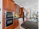 Modern kitchen boasts stainless steel appliances, granite counters, and custom cabinetry at 2162 Pine Mountain Nw Rd, Kennesaw, GA 30152