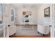 Bright office with wainscoting, hardwood floors, and French door entrance at 2162 Pine Mountain Nw Rd, Kennesaw, GA 30152
