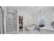 Elegant bathroom with a standalone tub, open walk-in closet, and a luxurious shower at 2850 Stonehall Se Ct, Smyrna, GA 30080