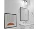 Modern half bathroom featuring a stylish mirror and vanity at 2850 Stonehall Se Ct, Smyrna, GA 30080