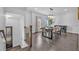 Elegant dining room with modern lighting and ample seating space at 2850 Stonehall Se Ct, Smyrna, GA 30080
