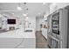 Spacious kitchen with a large island and stainless steel refrigerator at 2850 Stonehall Se Ct, Smyrna, GA 30080