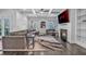 Bright living room with fireplace, large sofa, and coffered ceilings at 2850 Stonehall Se Ct, Smyrna, GA 30080