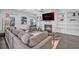 Spacious living room with fireplace, built-ins, and large sectional sofa at 2850 Stonehall Se Ct, Smyrna, GA 30080