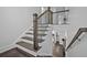 Staircase with metal railing at 2850 Stonehall Se Ct, Smyrna, GA 30080
