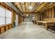 Unfinished basement with exposed framing, concrete floors, and ample open space for customization at 4012 Grand Park Ne Dr, Suwanee, GA 30024