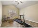 Bonus room featuring hardwood floors, vaulted ceilings, and natural light at 4012 Grand Park Ne Dr, Suwanee, GA 30024
