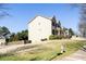 Side view of house with large yard at 4012 Grand Park Ne Dr, Suwanee, GA 30024