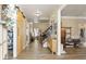Elegant foyer with hardwood floors and natural light throughout the entryway at 4012 Grand Park Ne Dr, Suwanee, GA 30024