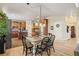 Spacious kitchen features wood cabinets, stainless appliances, granite countertops, and a breakfast nook at 4012 Grand Park Ne Dr, Suwanee, GA 30024