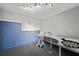 Spacious basement featuring a dart board and plenty of storage space at 4249 Caveat Ct, Fairburn, GA 30213