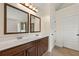Bathroom with double sink vanity and two mirrors at 4249 Caveat Ct, Fairburn, GA 30213