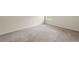 Neutral toned room with carpet and a window providing natural light at 4249 Caveat Ct, Fairburn, GA 30213