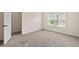 Bedroom with neutral walls and carpet, and a closet at 4249 Caveat Ct, Fairburn, GA 30213