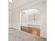 Open-concept living area with neutral paint, crown molding, and natural light at 4249 Caveat Ct, Fairburn, GA 30213