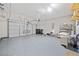 Spacious two car garage with epoxy flooring and ample storage, ready to store your vehicles at 2625 Draw Dr, Marietta, GA 30066