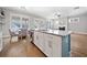 Bright kitchen area with a view into the living room and fireplace at 2625 Draw Dr, Marietta, GA 30066