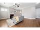 Bright living room with hardwood floors, fireplace, and neutral paint at 2625 Draw Dr, Marietta, GA 30066