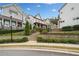 A view of the homes in the neighborhood with stone and manicured landscaping at 2625 Draw Dr, Marietta, GA 30066