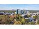 Scenic aerial view of Atlanta skyline and medical buildings surrounded by lush green trees at 765 Houston Mill Ne Rd # 7, Atlanta, GA 30329