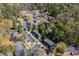 Aerial view of a garden style apartment community with mature trees and ample parking at 765 Houston Mill Ne Rd # 7, Atlanta, GA 30329
