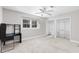 Bright bedroom with carpet, built-in desk and large closets, perfect for organized storage at 765 Houston Mill Ne Rd # 7, Atlanta, GA 30329