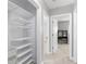 A walk-in closet featuring adjustable shelving and ample storage space for organization at 765 Houston Mill Ne Rd # 7, Atlanta, GA 30329