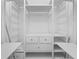 A walk-in closet with custom shelving and drawers for organized storage at 765 Houston Mill Ne Rd # 7, Atlanta, GA 30329