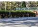 Pet-friendly community with designated dog park area for furry friends, lined with mature trees and a water spigot at 765 Houston Mill Ne Rd # 7, Atlanta, GA 30329