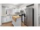 Bright kitchen featuring stainless steel appliances and center island at 765 Houston Mill Ne Rd # 7, Atlanta, GA 30329