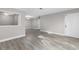 Open-concept living room features hard surface flooring and neutral paint at 765 Houston Mill Ne Rd # 7, Atlanta, GA 30329
