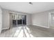 Inviting living space with wood-style floors and sliding glass doors to the balcony and natural light at 765 Houston Mill Ne Rd # 7, Atlanta, GA 30329