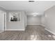 This living room features an opening to the kitchen with recessed lighting at 765 Houston Mill Ne Rd # 7, Atlanta, GA 30329
