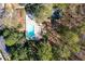 Aerial view of a refreshing community pool surrounded by mature trees at 765 Houston Mill Ne Rd # 7, Atlanta, GA 30329